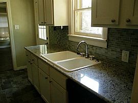  Charming Cottage with Great Drive Up and Backyard Space. in Dallas, TX (Photo 5 of 6)