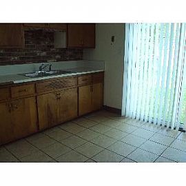 Clean Large Home with Fenced Yard with Matured Tree in Milwaukee, WI (Photo 2 of 5)