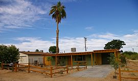 Trendy Furnished Palm House - Includes Utilities, Directv, Wifi in Twentynine Palms, CA (Photo 1 of 12)