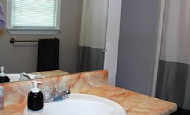 Beautiful 3 Bedroom 2 Bathroom, Rock Fireplace and Hardwood Flo in Douglasville, GA (Photo 5 of 6)