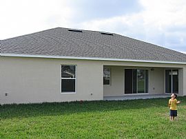 4 Bedroom Home in Great Location in Palm Bay, FL (Photo 4 of 12)