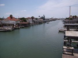 A Water Front, Furnished, Pool, Hot Tub,Covered Boat Lift.   in Port Isabel, TX