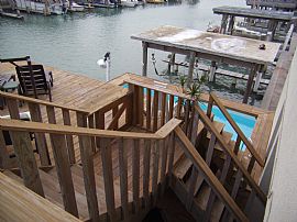 A Water Front, Furnished, Pool, Hot Tub,Covered Boat Lift.   in Port Isabel, TX (Photo 3 of 12)