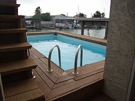 A Water Front, Furnished, Pool, Hot Tub,Covered Boat Lift.   in Port Isabel, TX (Photo 5 of 12)