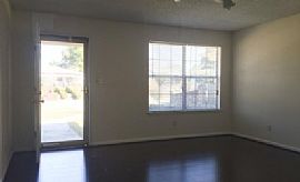 This Home Features a Large Living Room, Dining Room in Savannah, GA (Photo 7 of 8)