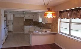 This Family Home Features a Formal Living Area in Edmond, OK