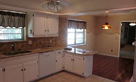 This Family Home Features a Formal Living Area in Edmond, OK (Photo 2 of 8)