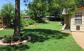 This Family Home Features a Formal Living Area in Edmond, OK (Photo 7 of 8)