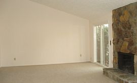Great Room with Stacked Stone Fireplace in Roswell, GA (Photo 3 of 8)
