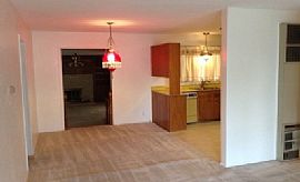 This 3br, 2ba, Home Features 2 Living Areas Both with Wood Burn in Albuquerque, NM