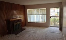 This 3br, 2ba, Home Features 2 Living Areas Both with Wood Burn in Albuquerque, NM (Photo 2 of 9)