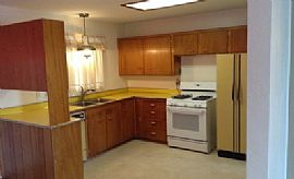 This 3br, 2ba, Home Features 2 Living Areas Both with Wood Burn in Albuquerque, NM (Photo 4 of 9)