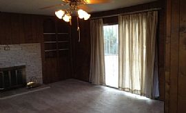 This 3br, 2ba, Home Features 2 Living Areas Both with Wood Burn in Albuquerque, NM (Photo 6 of 9)