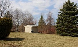 This 3 Bedroom, 1.5 Bathroom Home Has a Spacious Living Room in Farmington, NY (Photo 6 of 9)