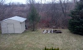 This 3 Bedroom, 1.5 Bathroom Home Has a Spacious Living Room in Farmington, NY (Photo 7 of 9)