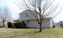 This 3 Bedroom, 1.5 Bathroom Home Has a Spacious Living Room in Farmington, NY (Photo 9 of 9)