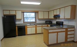 This Single Story Home Glistens with Fresh Paint and Hardwood F in Aurora, IL (Photo 2 of 6)