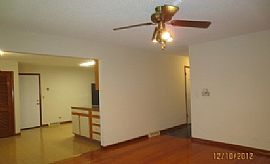 This Single Story Home Glistens with Fresh Paint and Hardwood F in Aurora, IL (Photo 3 of 6)