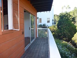 Tucked Away on a Quiet Mountaintop Road, This Split-Level 2 Bed in Los Angeles, CA (Photo 7 of 9)