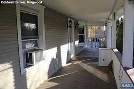  Bright and Spacious Cape Cod with Lemonade Porch! in Haskell, NJ (Photo 2 of 8)