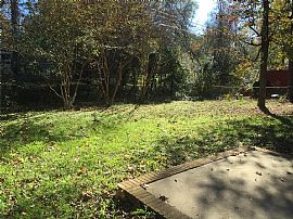 Split Level Home with Large Front and Backyard with Small Strea in Charlotte, NC (Photo 8 of 8)