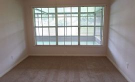 Beautiful Home on Pond with Gorgeous Views with Large Screened  in Brandon, FL (Photo 7 of 8)