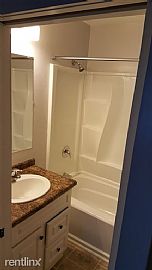 3 Bedrooms 2 Bathroom Spacious Backyard with Deck 1 Car Garage in Lansing, MI (Photo 4 of 10)