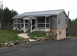 This Charming Three Bedroom, Two Bath Ranch Rests on Approximat in South Colton, NY