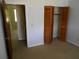 3 Bedroom / 1.5 Bath Roomy Living Room with   Wood Burning Stov in Columbus, GA (Photo 3 of 8)