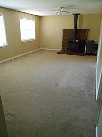 3 Bedroom / 1.5 Bath Roomy Living Room with   Wood Burning Stov in Columbus, GA (Photo 8 of 8)