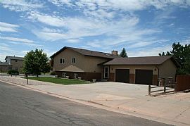 Large Fenced in Yard with Deck and Storage Shed.  in Laramie, WY