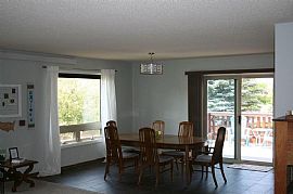 Large Fenced in Yard with Deck and Storage Shed.  in Laramie, WY (Photo 3 of 7)