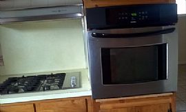 This 3 Bed and 2.5 Bath Home Features a Fenced in Backyard in Little Rock, AR (Photo 3 of 8)