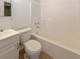 Beautifully Renovated 4 Bed/2 Bath Home in Phoenix, Az with Til in Phoenix, AZ (Photo 7 of 9)