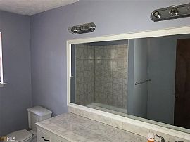 Single Family Home Has 4 Bedrooms and 2.0 Bathrooms. in Fairburn, GA (Photo 7 of 9)