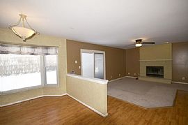 Beautiful and Spacious. Inviting Family Room with Fireplace in Crystal Lake, IL (Photo 2 of 8)
