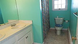 Spacious Ranch with 4 Bedrooms and 2.5 Baths in Portsmouth, RI (Photo 10 of 12)