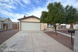 This Single-Level Home with 2 Car Garage  in Phoenix, AZ
