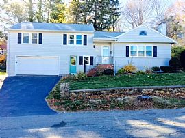 Enjoy This Spacious Multi-Level Home in The Heart of The Highly in Arlington, MA
