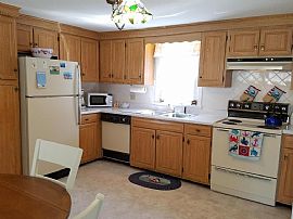 2 Beds 1 Bath 1,276 Sqft 0.32 Acres Lot Size Single-Family Home in Brewster, MA (Photo 3 of 5)