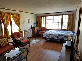 2 Beds 1 Bath 1,276 Sqft 0.32 Acres Lot Size Single-Family Home in Brewster, MA (Photo 5 of 5)