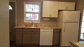 Home Is Larger Than It Appears. Fenced Yard, Corner Lot in O Fallon, IL (Photo 6 of 6)