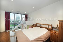 2-Bed/2-Bath Condo with Great Views and Parking at Renowned Gul in Jersey City, NJ (Photo 3 of 8)