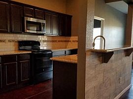 8605 E Millrun St, Wichita, Ks 67226 5 Beds 3 Baths 2,300 Sqft in Wichita, KS (Photo 3 of 11)