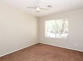 8719 W Bobby Lopez Dr, Tolleson, Az 85353 3 Beds 2 Baths 1,519  in Tolleson, AZ (Photo 2 of 9)