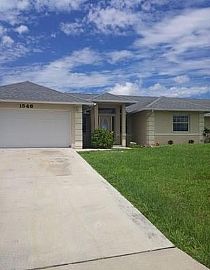 1546 Ne 8th Pl, Cape Coral, Fl 33909 in Cape Coral, FL
