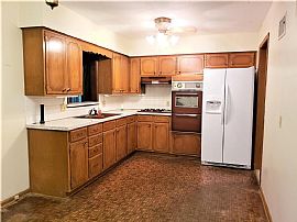 Huge Family Room Addition and 3-Season Sun Room Provide Over 50 in Independence, MO (Photo 2 of 6)