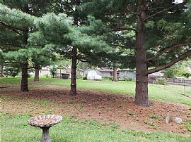 Huge Family Room Addition and 3-Season Sun Room Provide Over 50 in Independence, MO (Photo 6 of 6)