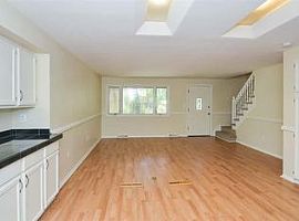 The Kitchen Is Equipped with Updated Appliances in Arvada, CO (Photo 3 of 6)