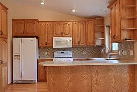 4 Bedroom 3 Bathroom Home at 305 N Dewberry Ave, Sioux in Sioux Falls, SD (Photo 5 of 10)